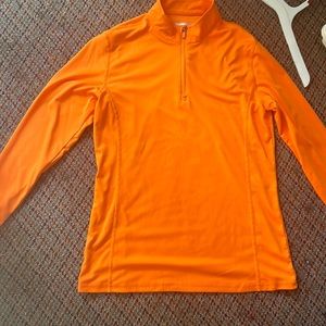 Orange long sleeve shirt only been worn once was used for a school event